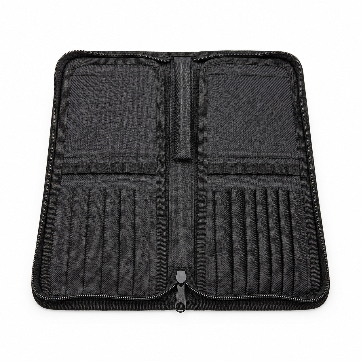 Open Rosemary & Co black nylon brush case showing empty brush dividers, elastic loops and zip-around storage layout