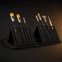 Rosemary & Co black nylon brush case opened as a twin standing easel with artist brushes held upright in individual dividers
