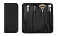 Rosemary & Co black nylon brush case shown open and closed, with individual brush pockets and zip-around storage design