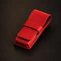Rosemary & Co red leather 3 pocket brush wallet shown closed for storing short pocket travel brushes