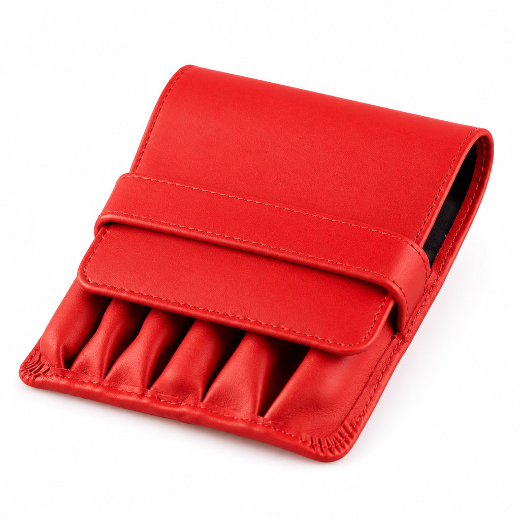Closed Rosemary & Co red leather 6 pocket travel brush wallet with fold-over flap and tuck strap