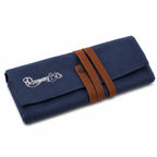 Closed Rosemary & Co small navy canvas brush wrap with wrap-around leather strap and press-stud closure