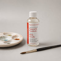 Rosemary & Co brush cleaner and conditioner 100ml beside a Series 7 sable brush and a ceramic mixing palette
