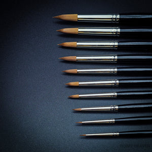 Close-up of fine pointed tips of Rosemary & Co Red Dot Spotters brushes
