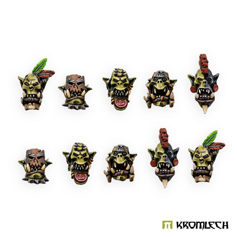 Kromlech Savage Orcs Heads, all ten painted: wooden masks, a feathered head and a red braided crest