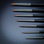 Range of Series 7 brush sizes showcased against dark backdrop, from smallest to largest