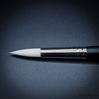 Close-up of Snowdrop size 16 brush head showing the full white taklon belly