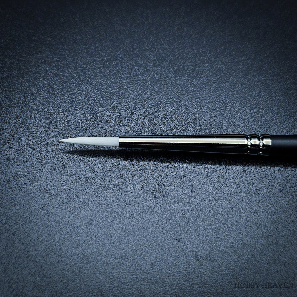 Close-up of Snowdrop size 2 brush head showing the tapered white taklon point