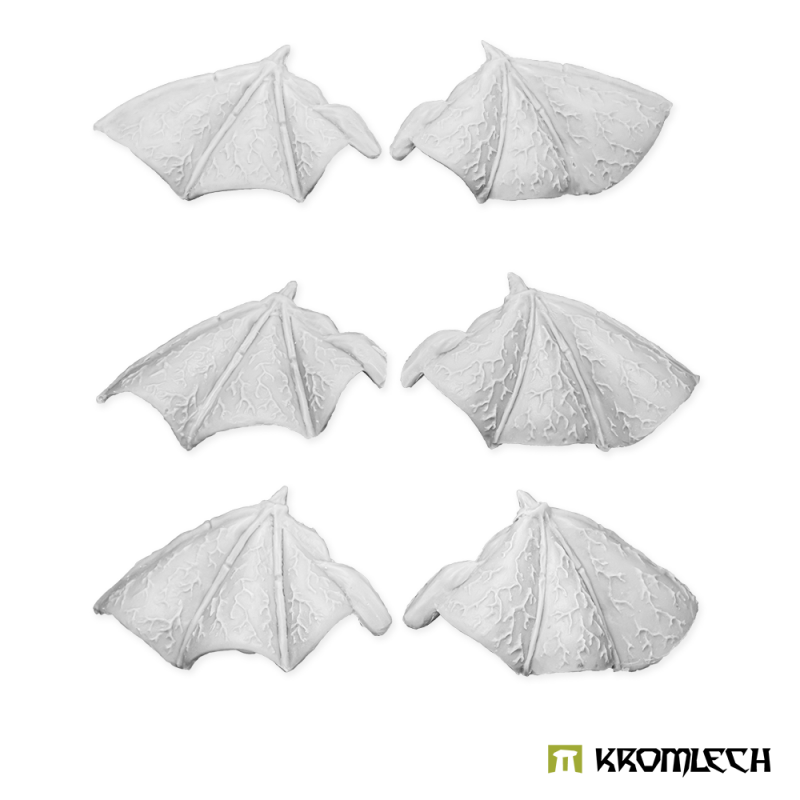 The three pairs of leathery wings as unpainted pale resin