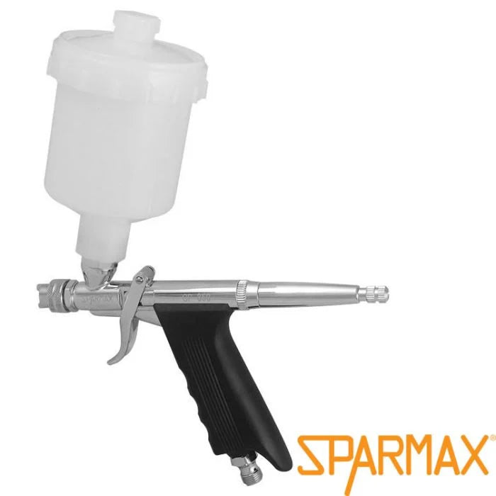 Sparmax GP-850 spray gun on white in side view with the 125 ml gravity cup and pre-set handle