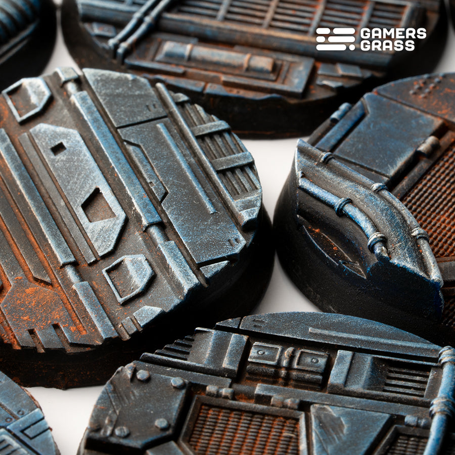 Detail shot of 40mm Spaceship Corridor bases: raised panels, riveted plates and conduit crossing worn decking