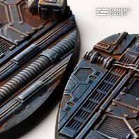 Extreme close-up of 90mm oval Spaceship Corridor base showing intricate mechanical details and industrial patterns

