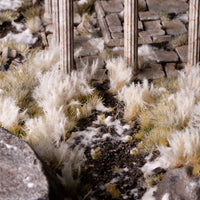 Breathtaking winter diorama featuring Spikey Winter 12mm - Wild Tufts, showcasing a realistic frozen landscape with snow-covered shrubs and icy terrain
