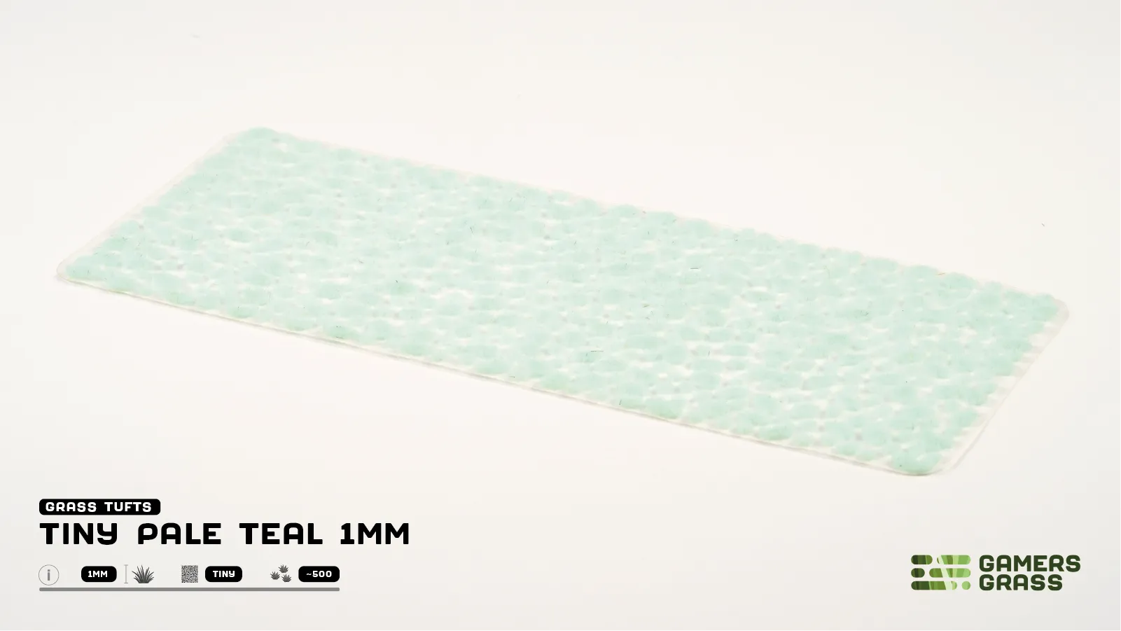 Gamers Grass Tiny Pale Teal 1mm full tuft sheet showing approximately 500 individual pale teal micro tufts