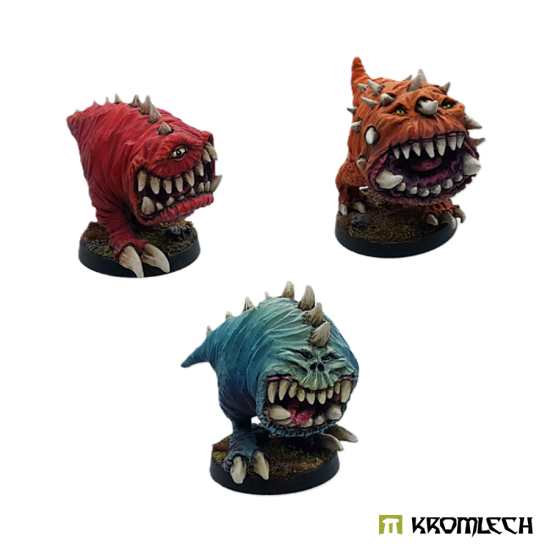 A red Gnaw, a spiky orange Gnaw and a blue Gnaw, painted