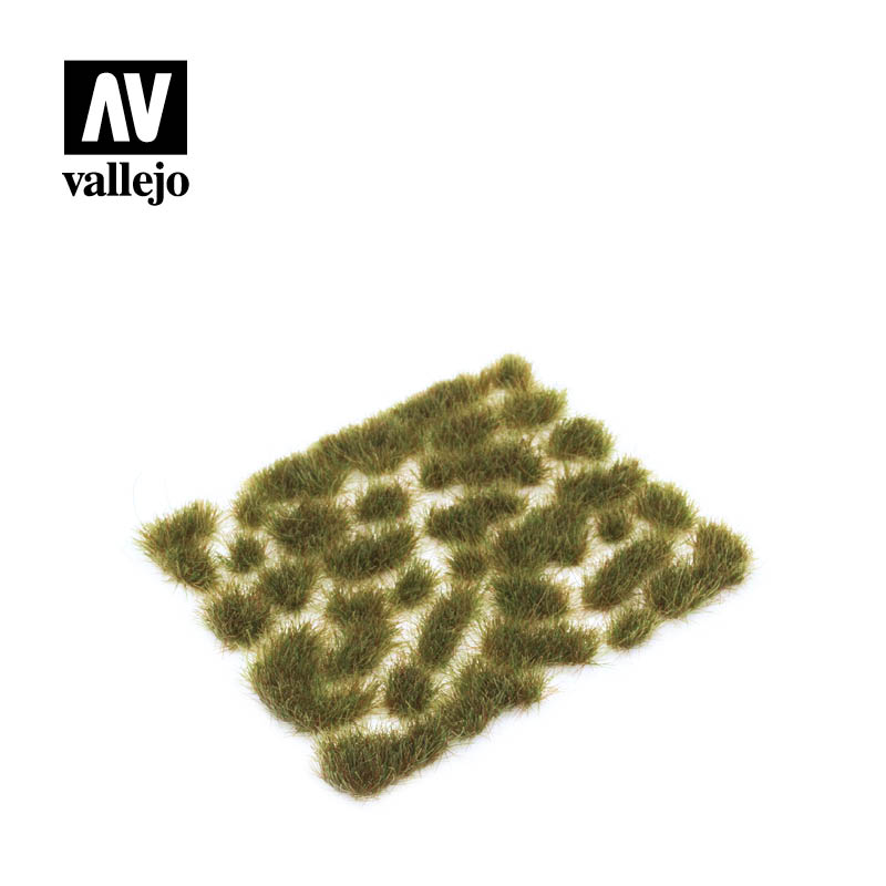 Close-up of Vallejo SC416 Wild Tuft Mixed Green 6mm, displaying varied textures and colors of miniature grass tufts