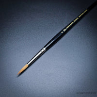 Winsor & Newton Series 7 Kolinsky Sable Brush size 4 on black surface
