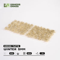 Sheet of 70 Winter 5mm - Wild Tufts, displaying various shapes and sizes of light-colored grass tufts with hints of darker tones, ready for winter scenery
