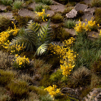 Lifelike diorama featuring Yellow Flowers - Wild tufts, showcasing a vibrant blooming landscape with varied textures, including mountain scrubland, wildflower meadows, and garden flowers
