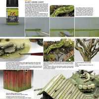 Realistic moss and damp effects created with AK027 Slimy Grime Light on boat hulls and water-exposed surfaces.