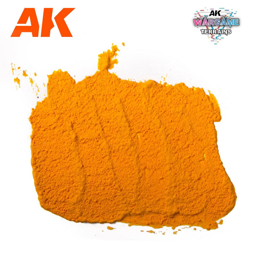 A spread swatch of AK1221 Sunrise Blaze on white, a coarse orange crust cracked across by the spreading strokes
