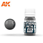 AK476 Xtreme Metal Steel: 30ml bottle with a ribbed white cap, beside a glossy dark grey steel sphere.