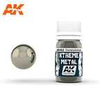 AK482 Xtreme Metal Duraluminium: 30ml bottle with a ribbed white cap, beside a glossy pale champagne-grey metal sphere.