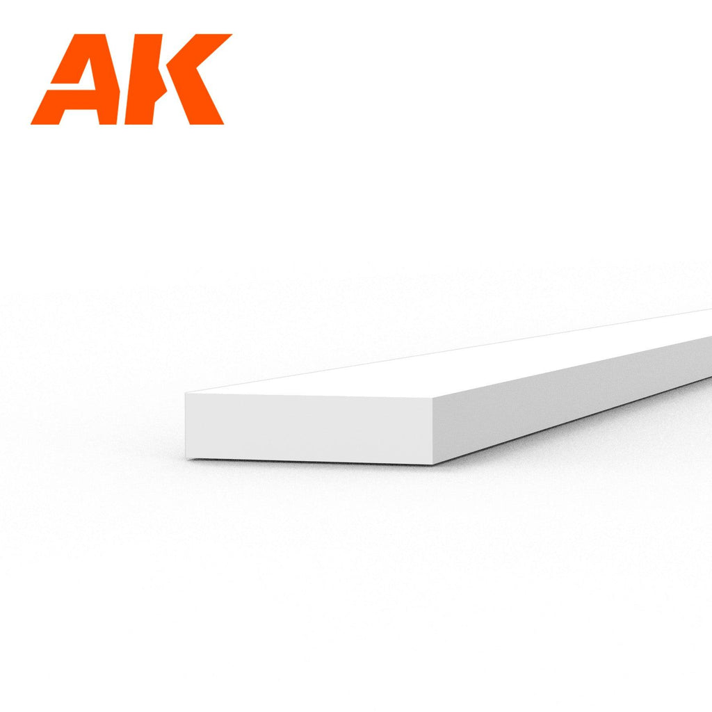AK6516 styrene strip on white: a broad flat white plastic length, its end face four times wider than it is thick