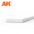 AK6517 styrene strip on white: a wide flat white plastic length, its end face far broader than it is thick