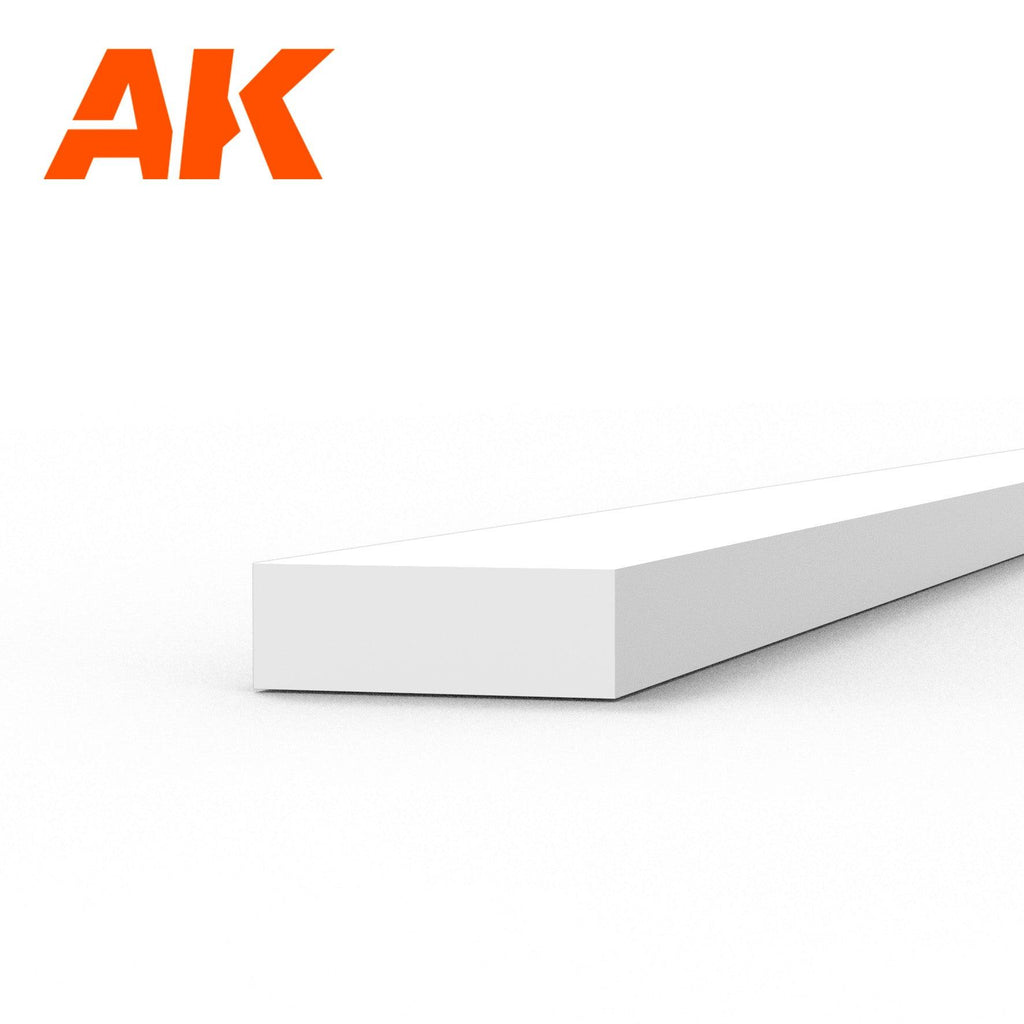 AK6521 styrene strip on white: a broad white plastic length, its end face three times wider than it is deep