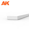 AK6521 styrene strip on white: a broad white plastic length, its end face three times wider than it is deep