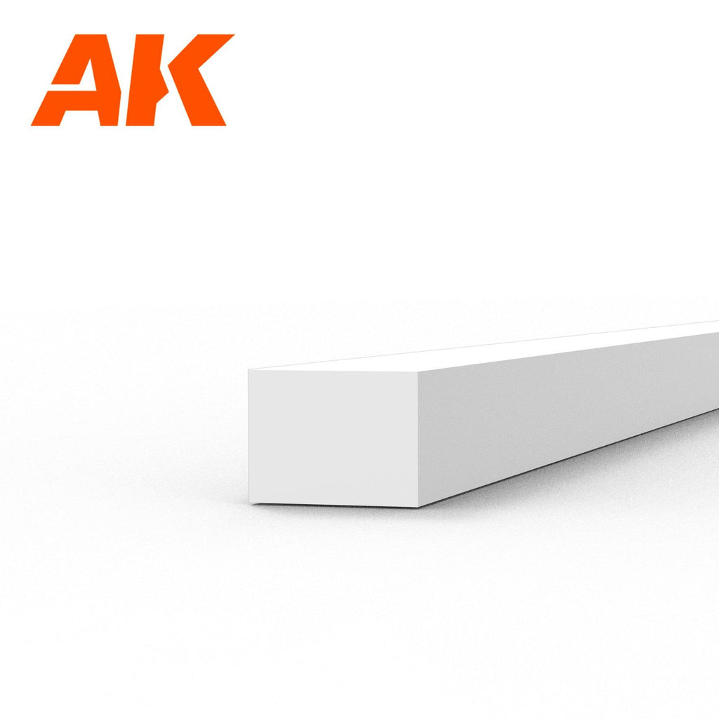 AK6525 styrene strip on white: a deep white plastic bar, its end face a little wider than it is tall