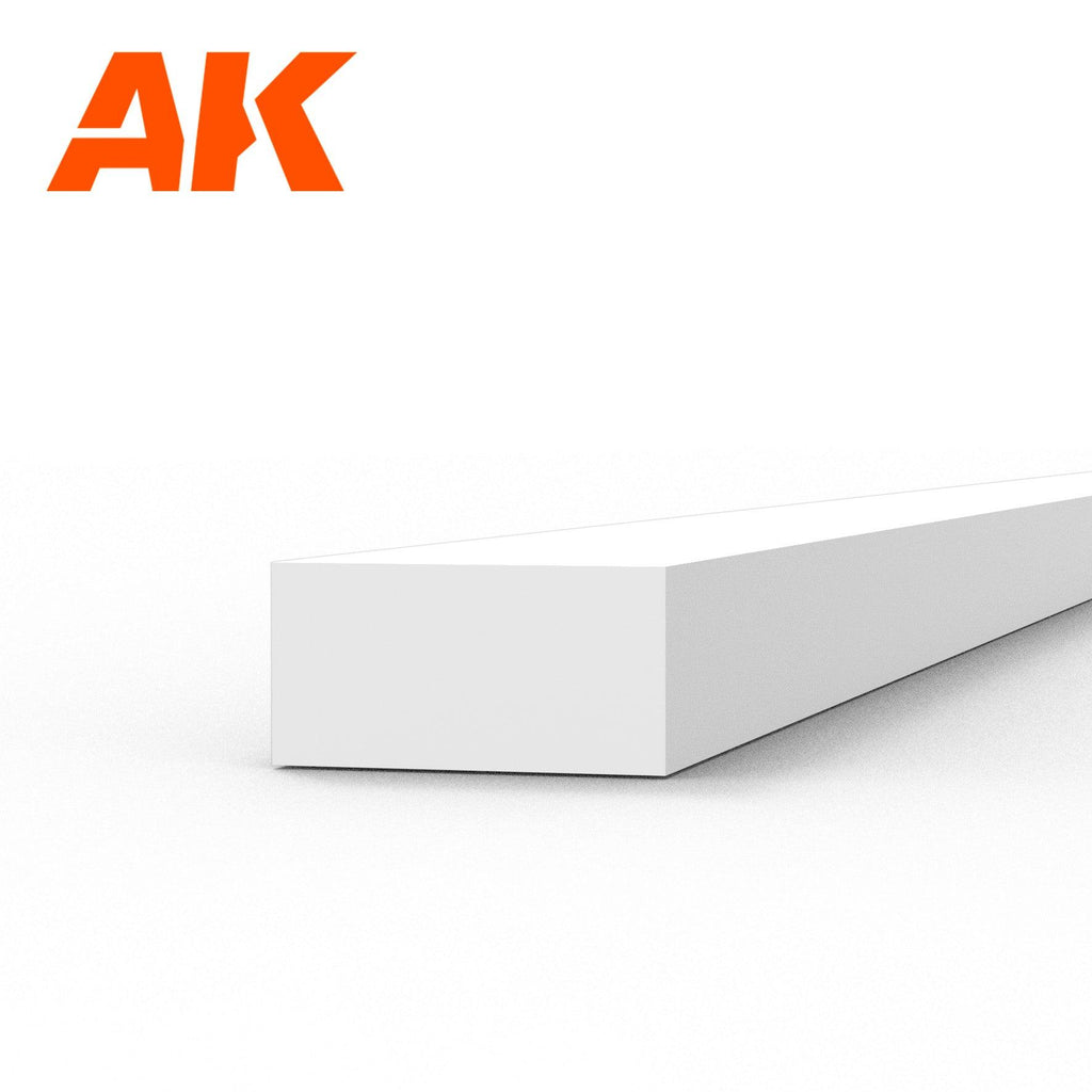 AK6526 styrene strip on white: a heavy white plastic bar, its end face twice as wide as it is deep