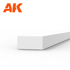 AK6526 styrene strip on white: a heavy white plastic bar, its end face twice as wide as it is deep