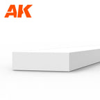 AK6528 styrene strip on white: a broad white plastic bar, its end face over three times wider than it is deep