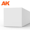 AK6535 styrene strip end-on: a thick white plastic bar, its square end face filling the frame