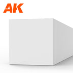 AK6535 styrene strip end-on: a thick white plastic bar, its square end face filling the frame