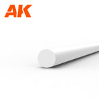 AK6539 styrene rod seen end-on: one white plastic rod, 1.5 mm in diameter, its length receding to the right