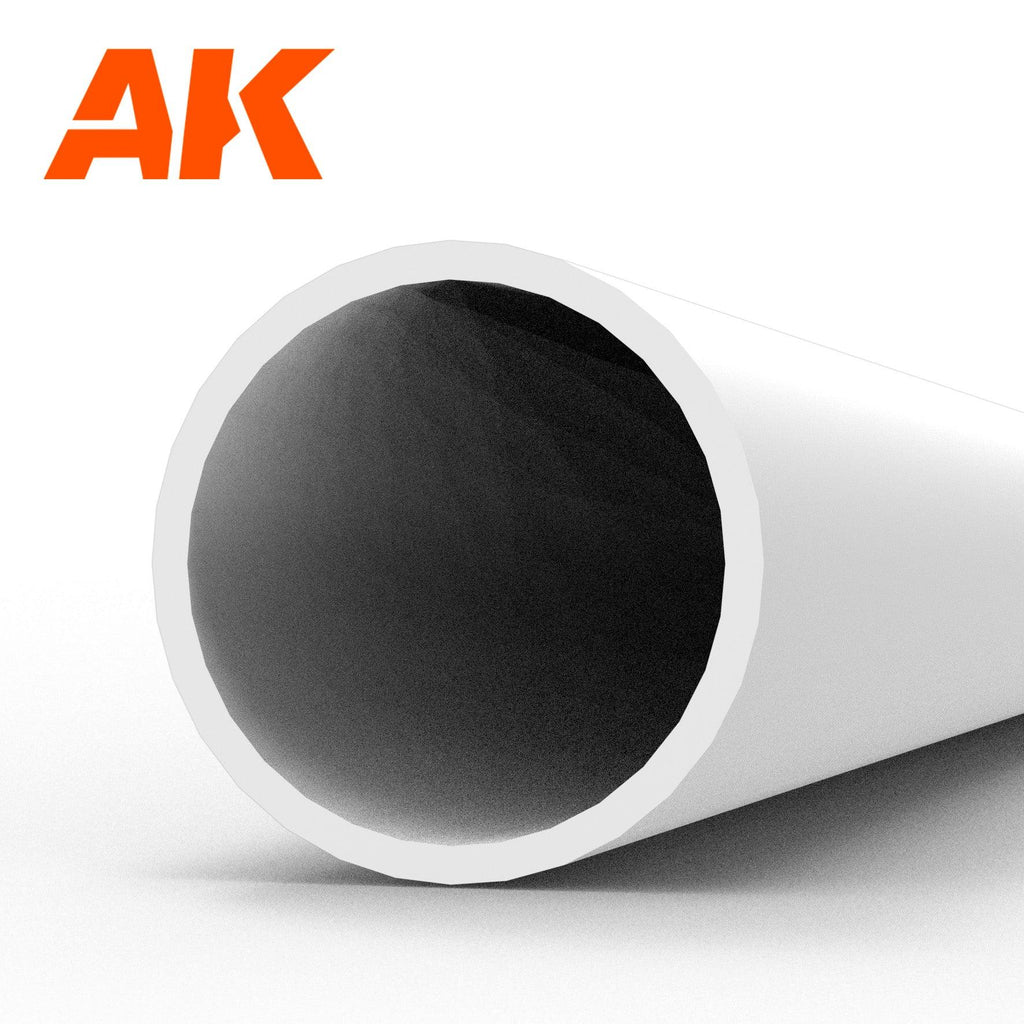AK6545 styrene hollow tube seen end-on: a white plastic pipe, its wall a pale ring around the dark opening