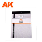 The still water sheet in AK's hanging sleeve, its ripple reading clear against the white backing card