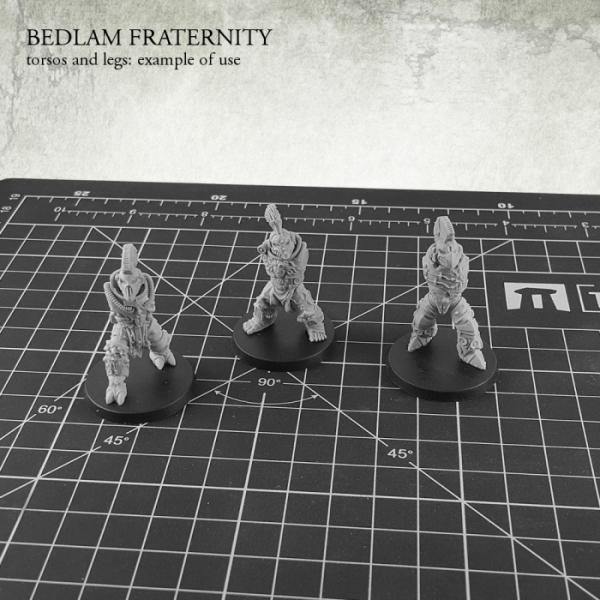 Kromlech Bedlam Fraternity torsos and legs example of use three assembled miniatures on cutting mat