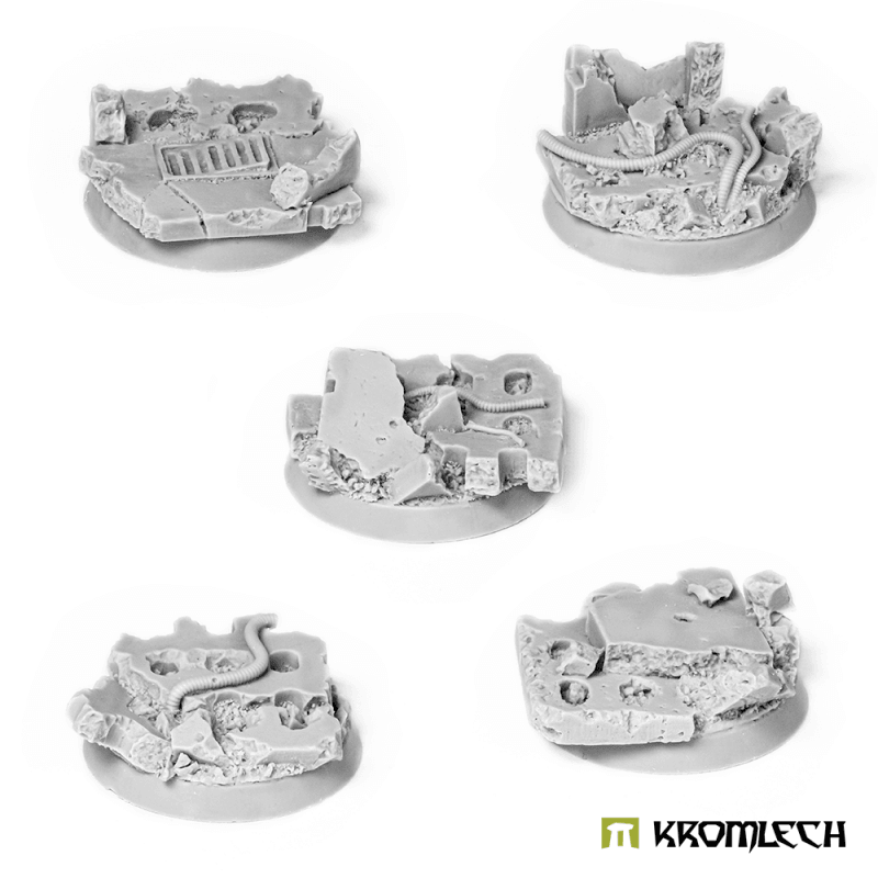 Five Kromlech KRRB014 32mm concrete slab bases in unpainted grey resin with cracked concrete and pipe detail