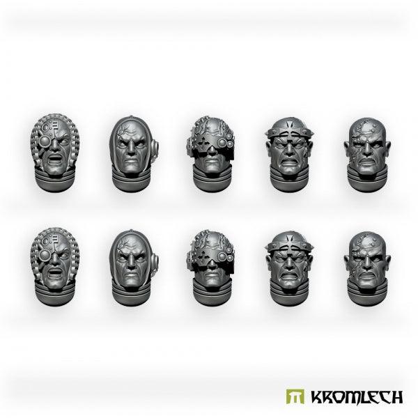 Ten unpainted Imperial Crusaders heads in dark grey resin, seen front on, with tonsures, scars and studded brow plates