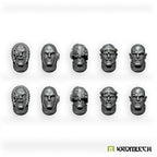 Ten unpainted Imperial Crusaders heads in dark grey resin, seen front on, with tonsures, scars and studded brow plates