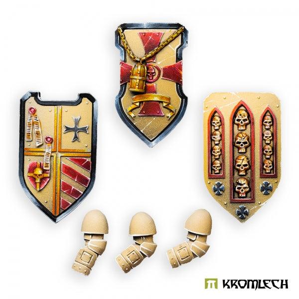 Three painted Imperial Crusaders thunder shields, each face a different heraldry, above the three left arms that hold them