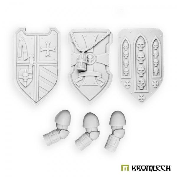 The same three shields and three left arms unpainted in pale grey resin, showing the cross, scroll and skull-niche patterns