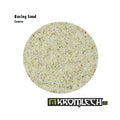 Kromlech coarse basing sand close-up circular swatch showing cream-coloured 1 to 1.5 mm grains